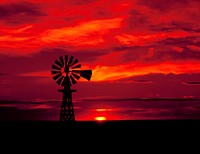 Windmill silhouetted at sunset in eastern Colorado. Original image from <a href="https://www.rawpixel.com/search/carol%20m.%20highsmith?sort=curated&amp;page=1">Carol M. Highsmith</a>&rsquo;s America, Library of Congress collection. Digitally enhanced by rawpixel.