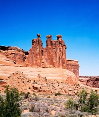 Three Gossips Formation, Arches National Park, Utah. Old Mammoth Road. Original image from <a href="https://www.rawpixel.com/search/carol%20m.%20highsmith?sort=curated&amp;page=1">Carol M. Highsmith</a>&rsquo;s America, Library of Congress collection. Digitally enhanced by rawpixel.