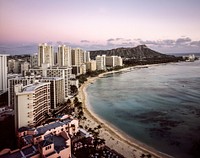 Dusk view of Waikiki Beach in Honolulu, Hawaii. Original image from <a href="https://www.rawpixel.com/search/carol%20m.%20highsmith?sort=curated&amp;page=1">Carol M. Highsmith</a>&rsquo;s America, Library of Congress collection. Digitally enhanced by rawpixel.