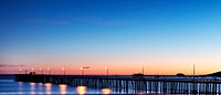 The Avila Beach pier at sunset. Original image from Carol M. Highsmith&rsquo;s America, Library of Congress collection. Digitally enhanced by rawpixel.