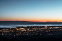 Dusk shot of Santa Barbara, California, and the Pacific shore, taken from bluffs high above the city. Original image from <a href="https://www.rawpixel.com/search/carol%20m.%20highsmith?sort=curated&amp;page=1">Carol M. Highsmith</a>&rsquo;s America, Library of Congress collection. Digitally enhanced by rawpixel.
