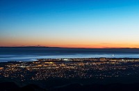 Dusk shot of Santa Barbara, California, and the Pacific shore, taken from bluffs high above the city. Original image from <a href="https://www.rawpixel.com/search/carol%20m.%20highsmith?sort=curated&amp;page=1">Carol M. Highsmith</a>&rsquo;s America, Library of Congress collection. Digitally enhanced by rawpixel.