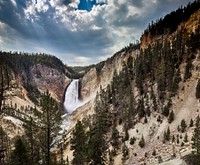 The Lower Falls of the Yellowstone River in northwestern Wyoming&#39;s Yellowstone National Park. Twice as high as Niagara Falls in the eastern state of New York, these are the highest-volume falls in the Rocky Mountains - Original image from <a href="https://www.rawpixel.com/search/carol%20m.%20highsmith?sort=curated&amp;page=1">Carol M. Highsmith</a>&rsquo;s America, Library of Congress collection.