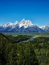 Spectacular peaks in the Teton Range seem to explode from the valley in Grand Teton National Park in northwest Wyoming. Original image from <a href="https://www.rawpixel.com/search/carol%20m.%20highsmith?sort=curated&amp;page=1">Carol M. Highsmith</a>&rsquo;s America, Library of Congress collection. Digitally enhanced by rawpixel.