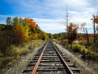 Fall along the railroad tracks in Bangor, Maine. Original image from <a href="https://www.rawpixel.com/search/carol%20m.%20highsmith?sort=curated&amp;page=1">Carol M. Highsmith</a>&rsquo;s America, Library of Congress collection. Digitally enhanced by rawpixel.