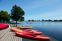 Bright-red canoes at Brittingham Park's beach on Lake Monona in Madison, Wisconsin's capital city. Original image from Carol M. Highsmith&rsquo;s America, Library of Congress collection. Digitally enhanced by rawpixel.