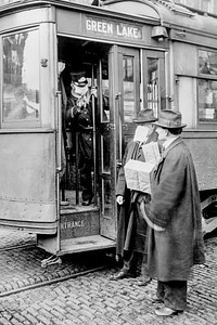 Precaution during the Spanish Influenza Epidemic would not permit anyone to ride on the street cars without wearing a mask, Seattle, Washington (ca.1918). Original from Library of Congress. Digitally enhanced by rawpixel.