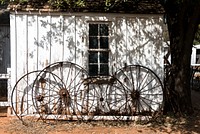 Wagon wheels against a shed. Original image from Carol M. Highsmith&rsquo;s America, Library of Congress collection. Digitally enhanced by rawpixel. 
