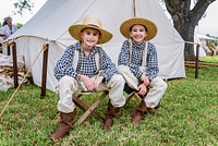 Boys at the civilian contingent in the Texan camp at the annual Battle of San Jacinto Festival and Battle Reenactment. Original image from <a href="https://www.rawpixel.com/search/carol%20m.%20highsmith?sort=curated&amp;page=1">Carol M. Highsmith</a>&rsquo;s America, Library of Congress collection. Digitally enhanced by rawpixel.