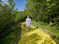 Dorothy strolls down the Yellow Brick Road in OZ in Boone, North Carolina. Original image from Carol M. Highsmith’s America, Library of Congress collection. Digitally enhanced by rawpixel.