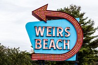 Neon sign to Weirs Beach, New Hampshire. Original image from Carol M. Highsmith’s America, Library of Congress collection. Digitally enhanced by rawpixel.