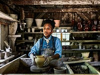 Costumed man works in the pottery shop at Old Sturbridge Village, New England&rsquo;s largest outdoor living-history museum, in Sturbridge, Massachusetts. Original image from Carol M. Highsmith&rsquo;s America, Library of Congress collection. Digitally enhanced by rawpixel.