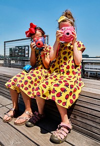 Sisters wearing identical dresses in New York, Original image from Carol M. Highsmith’s America, Library of Congress collection. Digitally enhanced by rawpixel.