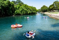 Tubing in Prince Solms Park on the Comal River in New Braunfels, near San Antonio. Original image from Carol M. Highsmith’s America, Library of Congress collection. Digitally enhanced by rawpixel.