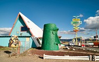 Green tiki head at the old Ranchero Motel in Anteres, Arizona. Original image from <a href="https://www.rawpixel.com/search/carol%20m.%20highsmith?sort=curated&amp;page=1">Carol M. Highsmith</a>&rsquo;s America, Library of Congress collection. Digitally enhanced by rawpixel.