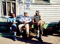 Friends relax in front of a home in Louisiana. Original image from Carol M. Highsmith’s America, Library of Congress collection. Digitally enhanced by rawpixel.