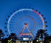 Neon-lit Ferris wheel at dusk in ICON Park in the Orlando, Florida. Original image from <a href="https://www.rawpixel.com/search/carol%20m.%20highsmith?sort=curated&amp;page=1">Carol M. Highsmith</a>&rsquo;s America, Library of Congress collection. Digitally enhanced by rawpixel.