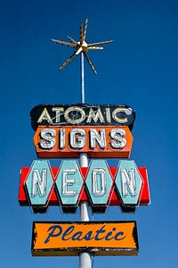 Atomic Signs sign, Route 550, Farmington, New Mexico (1980) photography in high resolution by John Margolies. Original from the Library of Congress. Digitally enhanced by rawpixel.