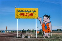 Welcome sign, Flintstone's Bedrock City, Rts. 64 and 180, Valle, Arizona (1987) photography in high resolution by John Margolies. Original from the Library of Congress. Digitally enhanced by rawpixel.