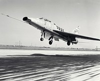 NACA Photographer North American F-100A (NACA-200) Super Sabre Airplane take-off. Original from NASA . Digitally enhanced by rawpixel.