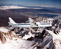 The DC-8 banking over the jagged peak of Mount Whitney on a February 25, 1998 flight. Original from NASA. Digitally enhanced by rawpixel.