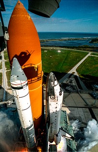 Space Shuttle Columbia climbs into orbit from Launch Pad 39B on Nov. 19, 1996. Original from NASA. Digitally enhanced by rawpixel.