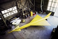 Supersonic Transport Model in the shop of the Ames 40x80 Foot Wind Tunnel, Apr 6th,1961. Original from NASA. Digitally enhanced by rawpixel.