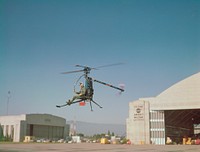 Hiller rotorcycle YROE-1 hovers in front of the Ames Hangar, June 11th, 1963. Original from NASA. Digitally enhanced by rawpixel.