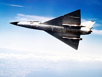 Convair F-106B Delta Dart rolls to the right to reveal the two research engines installed under its wings by the National Aeronautics and Space Administration (NASA) Lewis Research Center. Original from NASA . Digitally enhanced by rawpixel.