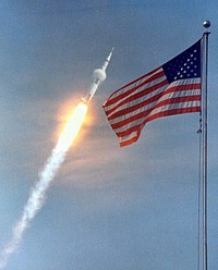 The American Flag heralds the flight of Apollo 11, man's first lunar landing mission. Original from NASA. Digitally enhanced by rawpixel.