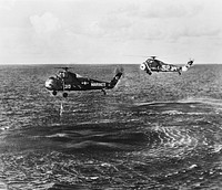 Marine Corps helicopter retrieves astronaut Virgil I. Grissom from the Atlantic Ocean on July 21, 1961. Original from NASA. Digitally enhanced by rawpixel.