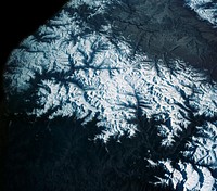 View of the Himalaya Mountain Range in the India-Nepal-Tibet border area. Original from NASA. Digitally enhanced by rawpixel.