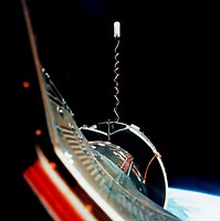 The Gemini-10 spacecraft is successfully docked with the Agena Target Docking Vehicle 5005. Original from NASA. Digitally enhanced by rawpixel.
