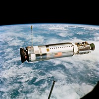 Excellent stereo and side view of the Agena Target Docking Vehicle as seen from the Gemini-12 spacecraft. Original from NASA . Digitally enhanced by rawpixel.