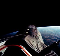 The Gemini-12 spacecraft during standup extravehicular activity with the hatch open. Original from NASA. Digitally enhanced by rawpixel.