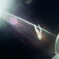 The Augmented Target Docking Adapter is photographed against the background of the blackness of space from the Gemini-9 spacecraft. Original from NASA . Digitally enhanced by rawpixel.