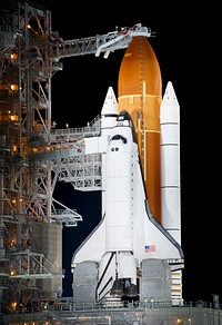 The space shuttle Endeavour is seen on launch pad 39a at Kennedy Space Center in Cape Canaveral, Fla, Thursday, April 28, 2011. Original from NASA. Digitally enhanced by rawpixel.