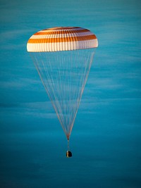 The Soyuz TMA-14M spacecraft as it lands with Expedition 42. Original from NASA. Digitally enhanced by rawpixel.