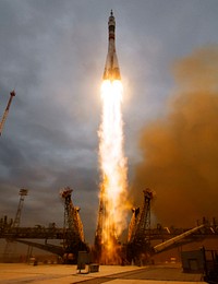The Soyuz MS-02 rocket is launched with Expedition 49 Soyuz commander Sergey Ryzhikov of Roscosmos, Oct. 19, 2016 at the Baikonur Cosmodrome in Kazakhstan. Original from NASA. Digitally enhanced by rawpixel.