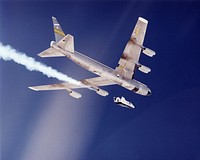 The second free-flight test of an evolving series of X-38 prototypes took place July 10, 2001 when the X-38 was released from NASA&#39;s B-52 mothership over the Edwards Air Force Base range in California&#39;s Mojave Desert. Original from NASA. Digitally enhanced by rawpixel.