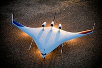 Boeing&#39;s X-48B Blended Wing Body technology demonstrator shows off its unique lines at sunset on Rogers Dry Lake adjacent to NASA DFRC. 2006-10-24. Original from NASA . Digitally enhanced by rawpixel.