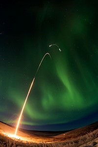 Sounding rocket launches successfully from Alaska and a green aurora dancing over Alaska. All four stages of the rocket are visible in this image. Jan. 28th, 2015. Original from NASA . Digitally enhanced by rawpixel.