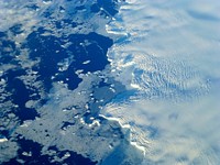 Edge of an ice shelf in Adelaide Island, off the Antarctic Peninsula. Original from NASA. Digitally enhanced by rawpixel.