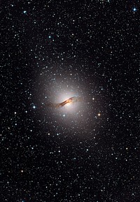 The giant elliptical galaxy NGC 5128, show here in visible light, hosts the radio source known as Centaurus A. Released on April 1st, 2010. Original from NASA . Digitally enhanced by rawpixel.