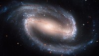 Barred Spiral Galaxy NGC 1300. Original from NASA. Digitally enhanced by rawpixel.