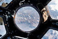 The Earth view from the cupola onboard the International Space Station. May 14th, 2015. Original from NASA. Digitally enhanced by rawpixel.