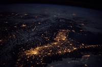 &quot;Beautiful night pass over Italy, Alps and Mediterranean.&quot; Original from NASA. Digitally enhanced by rawpixel.