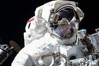 NASA astronaut Peggy Whitson is seen during the 200th spacewalk in support of the International Space Station on Dec 25, 2017. Original from NASA. Digitally enhanced by rawpixel.