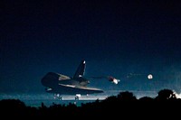 The drag chute is deployed as the space shuttle Atlantis lands on July 21, 2011 at the Kennedy Space Center in Florida. Original from NASA. Digitally enhanced by rawpixel.