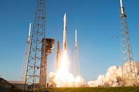 Rising from fire and smoke, NASA&#39;s Juno planetary probe, enclosed in its payload fairing, launches atop a United Launch Alliance Atlas V rocket. Original from NASA . Digitally enhanced by rawpixel.